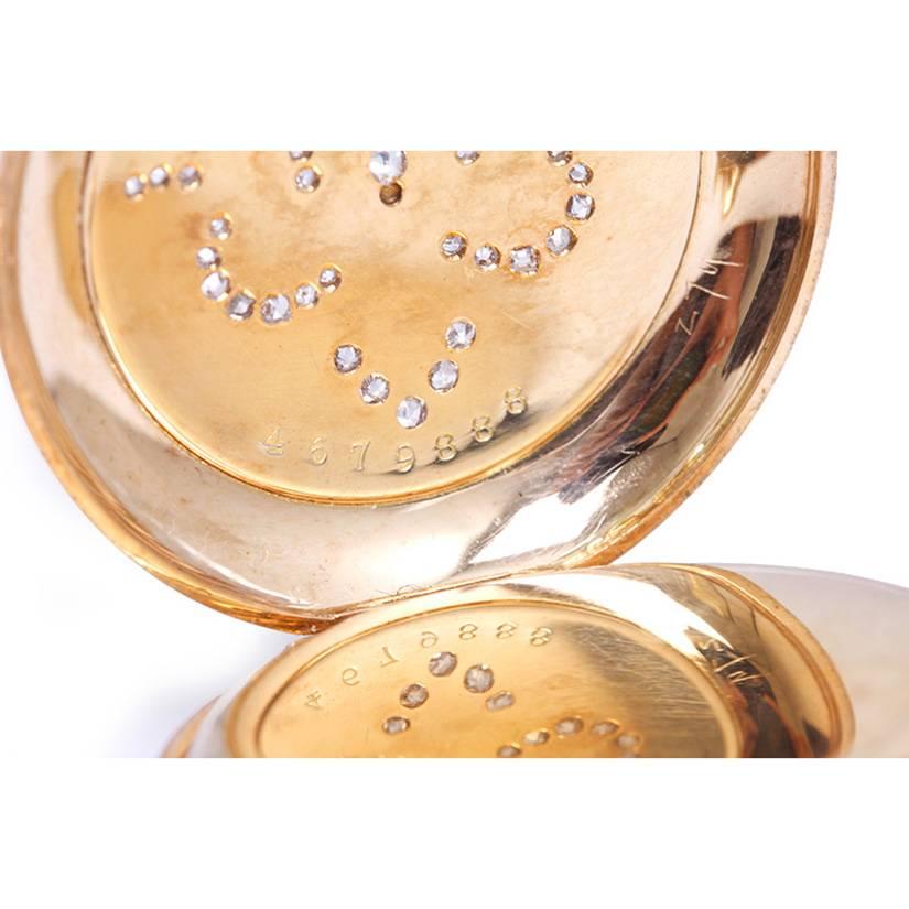 Elgin Ladies Yellow Gold Diamond Pocket or Pendant Watch -  Manual winding 15 jewels. Yellow gold with bale; engraved HC on front with 3 first names engraved inside; beautiful design with diamonds on back cover;  (34mm diameter). White enamel dial