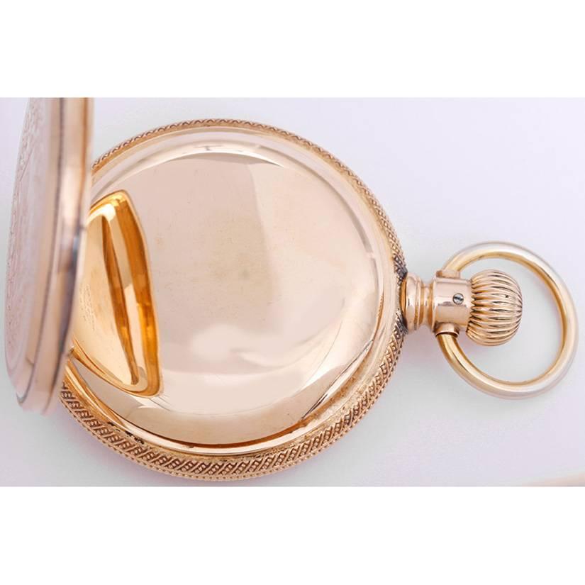 Elgin National Watch Co. Massive Heavy Solid Yellow Gold 18s Manual winding Pocket Watch. Massive solid yellow gold 18s case ornately engraved on back with floral motif with a house and lake on the back and with what appears to be initials J.A.M. on