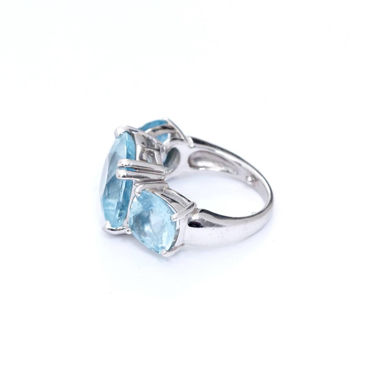 Seaman Schepps Ring Three Stone Ring - . Classic White Gold Three stone Aquamarine Ring .  Hallmarks: Seaman Schepps, 750, copyright, maker's mark, reference numbers. Total weigth is 10 grams.Size 5 