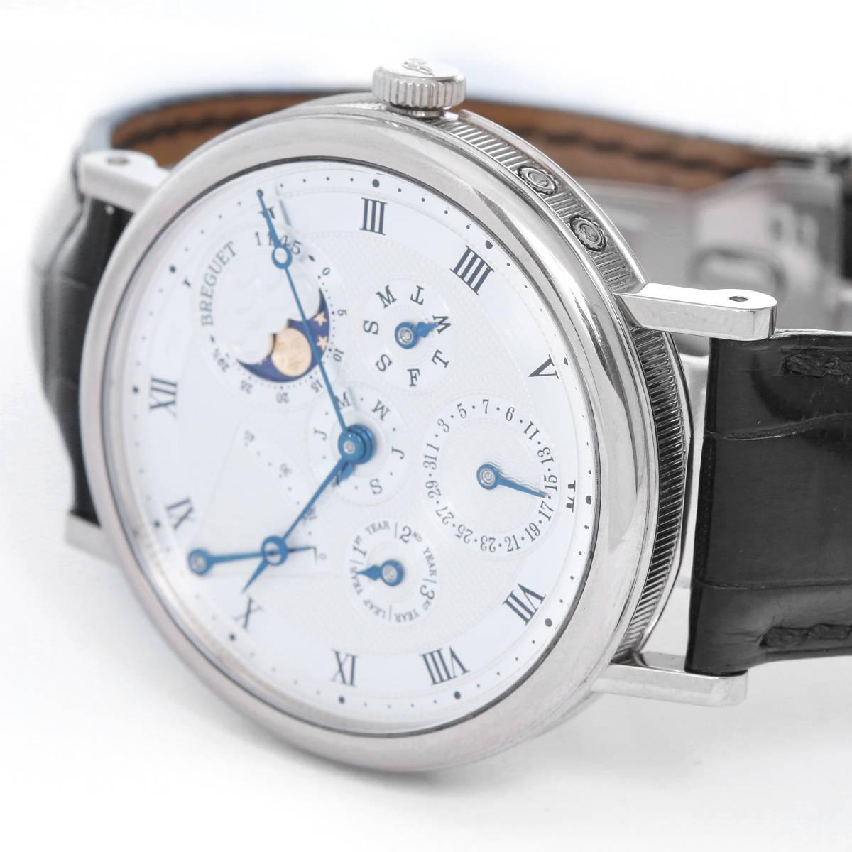 Breguet Perpetual Calendar Power Reserve Men's 18k White Watch Ref. 5327BB/1E/986 (or 5327) -  Automatic winding. 18k white gold case with exposition back  (39mm diameter). 2-Tone silvered dial with black Roman numerals; day, date, month, moonphase;