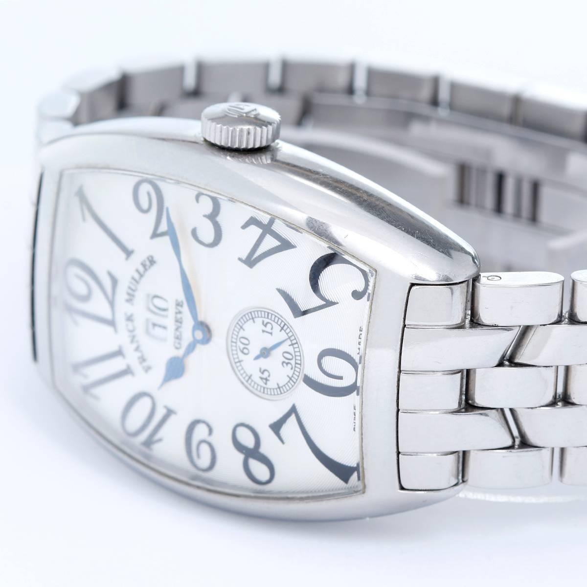 Franck Muller Cintree Curvex 6850 S6 GG Men's Watch -  Automatic. Stainless Steel (34 mm x 47 mm). Silvered guilloche dial; date at  12:00 o' clock, small seconds at 6:00 o'clock. Stainless Steel Franck Muller Link band. Pre-owned with box and