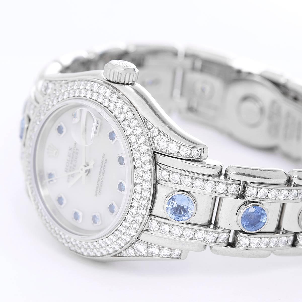 Rolex Ladies White Gold Diamonds Sapphire Pearlmaster Masterpiece Wristwatch In Excellent Condition In Dallas, TX