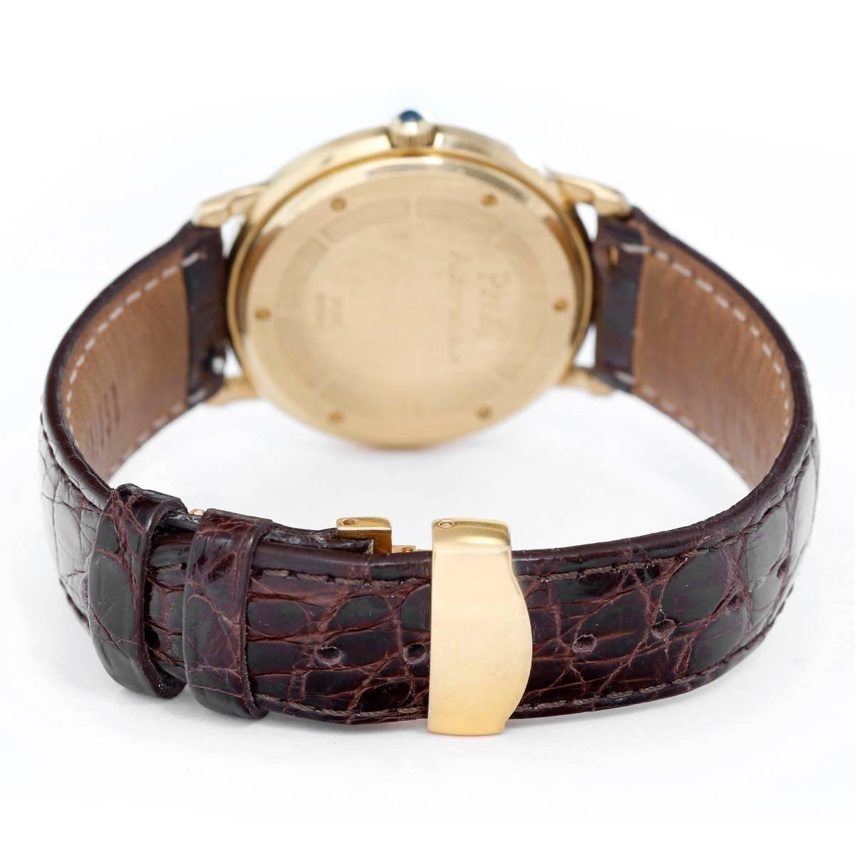 Piaget Automatic Yellow Gold Men's Watch Ref. 26920 -  Automatic winding. 18kt Yellow Gold (34 mm). White Guilloche with Roman numerals;  date at 3:00 o'clock. Brown Leather strap with buckle. Pre-owned.