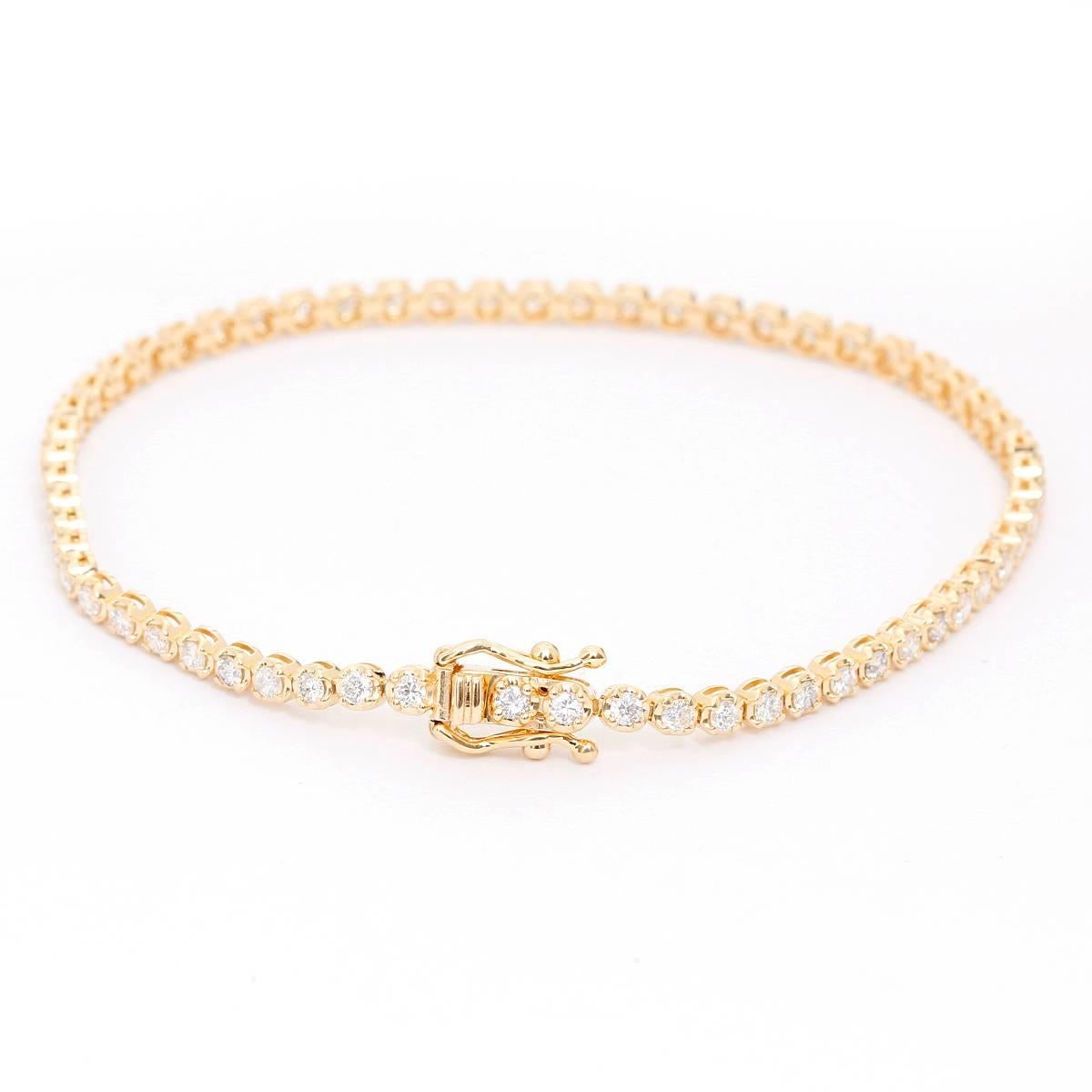 14k Yellow Gold 1.61 ct. Diamond Tennis Bracelet Size 6 3/4 - . This stunning tennis bracelet features 1.61 carats of SI2-SI3 clarity and HI-color diamonds set in 14k yellow gold. Bracelet measures apx. 6 3/4 inches in length. Total weight is 5.2