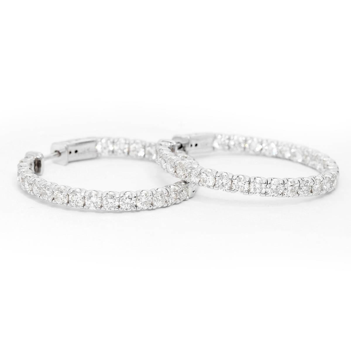 Beautiful 14k White Gold Inside-Out Diamond Hoop Earrings - . These beautiful 14k white gold hoop earrings are perfect for any occasion! The earrings feature apx. 6.2 carats of  VS2-SI1-clarity and H-I-color diamonds. Earrings measure apx. 1.5 inch