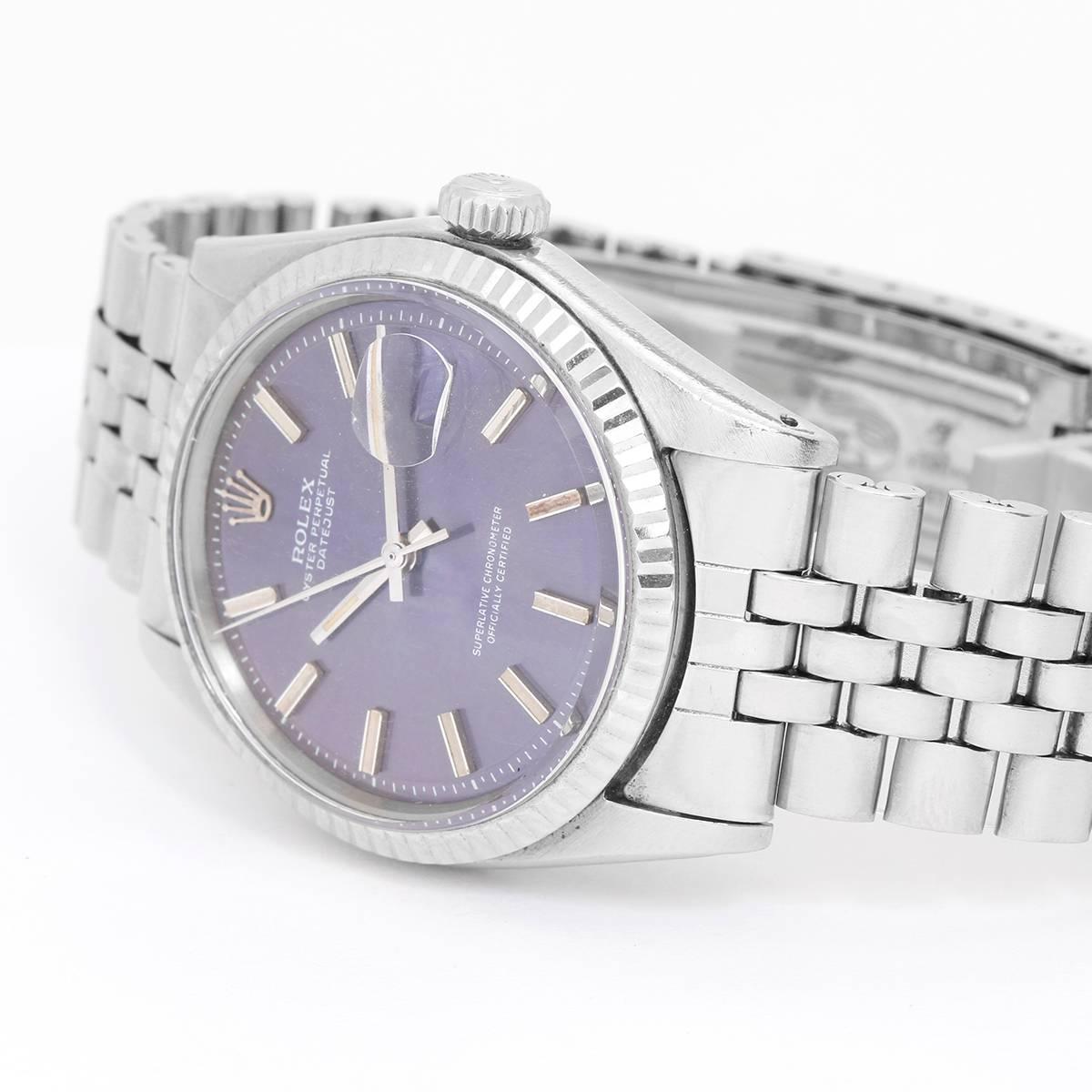  Automatic winding, acrylic crystal. Stainless steel case with white gold fluted bezel (36mm diameter). Original very rare tropical blue dial turned purple with light and age with stick markers. Stainless steel Jubilee bracelet. Pre-owned original