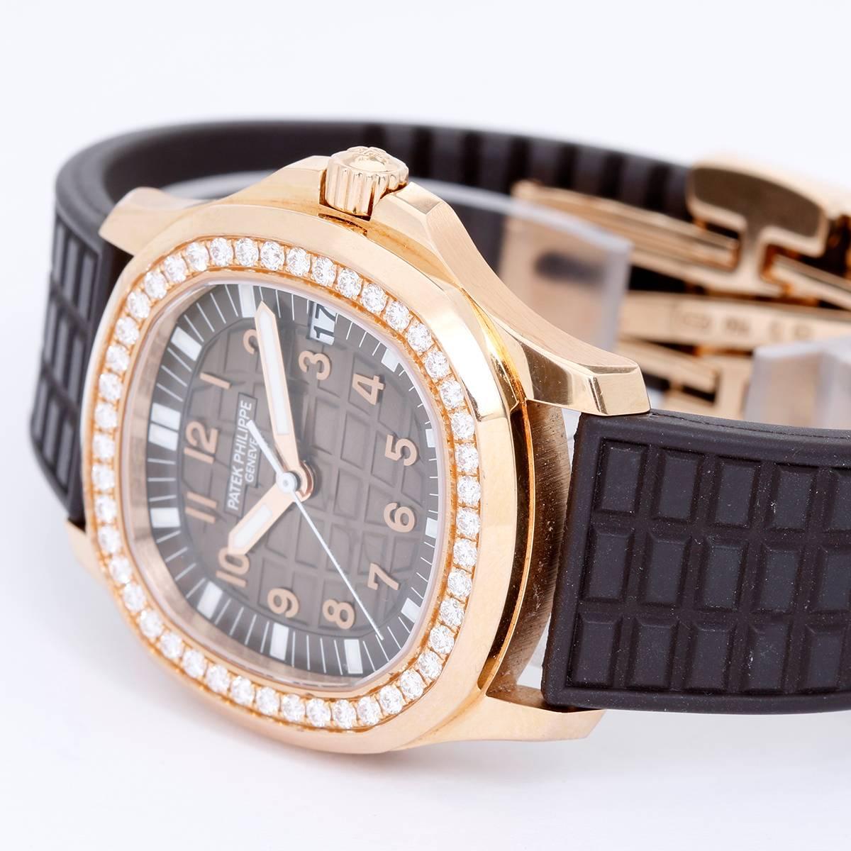 Patek Philippe Ladies  18k Rose Gold Aquanaut Watch 5068R-010 -  Automatic winding. 18k rose gold case with diamond bezel. Exposition back. (36x39mm). Chocolate waffle dial with rose Arabic numerals. Chocolate rubber strap band with 18k rose gold