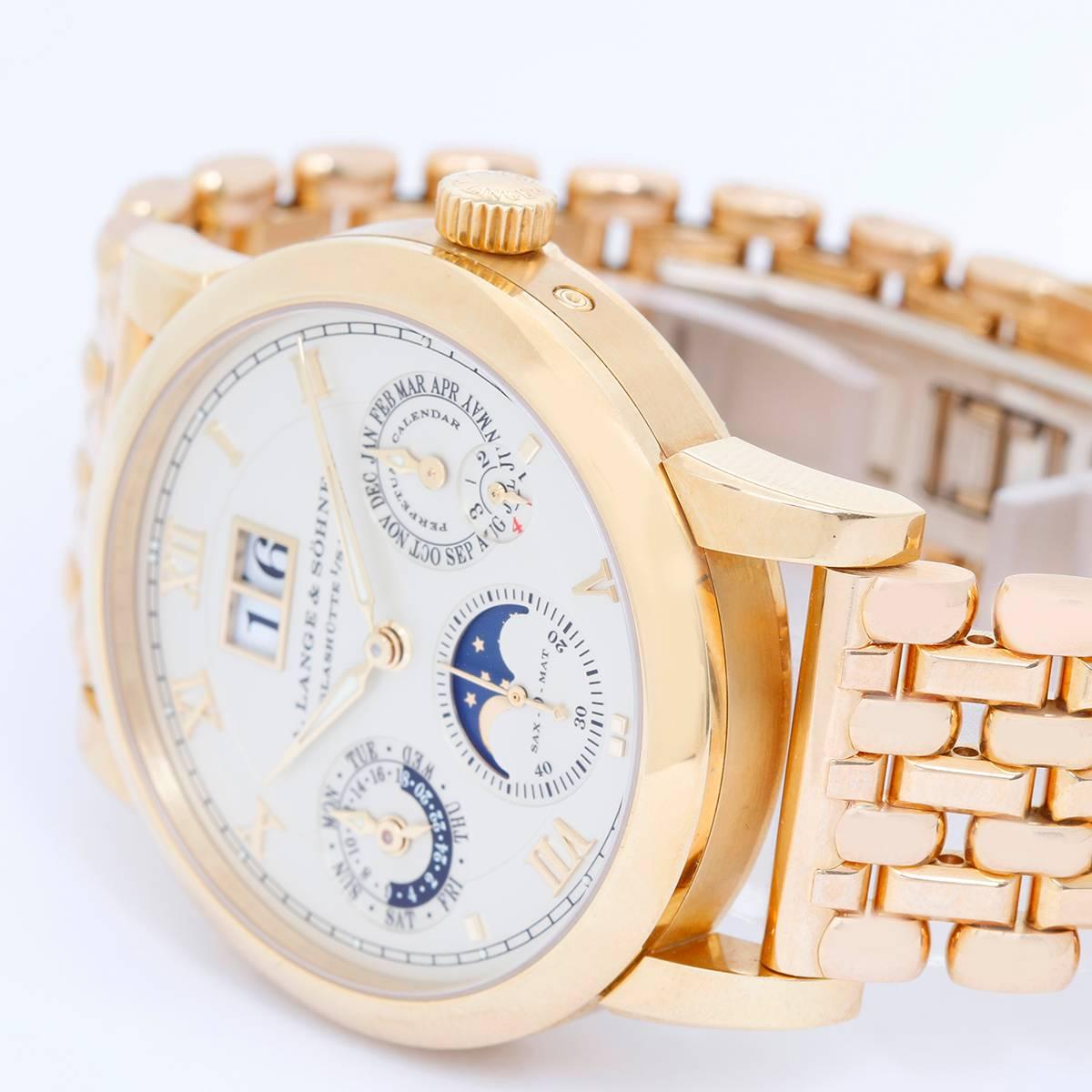 A. Lange & Sohne Langematik Perpetual  Calendar Men's Watch -  Automatic. 18K Yellow Gold ( 38m ). Champagne dial with raised Roman numerals; Sub dials at 3, 6 & 9 o'clock. 18K A. Lange & Sohne hidden dual deployant clasp. Pre-owned with box and