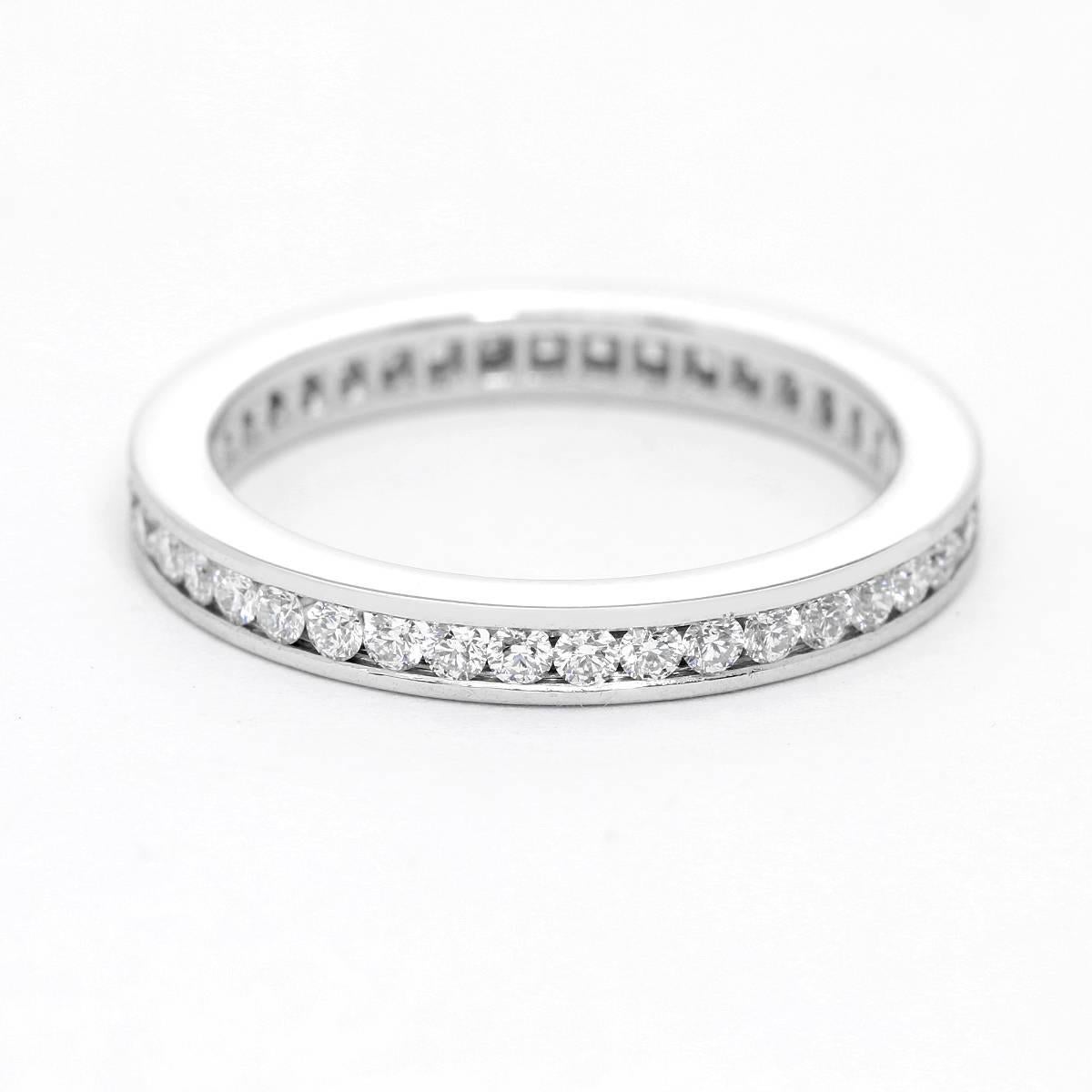 Cartier 1.9mm  Band Size  5 1/2 - . Pre-owned with Cartier box and papers .19 cts. Total weight 2.5 grams.