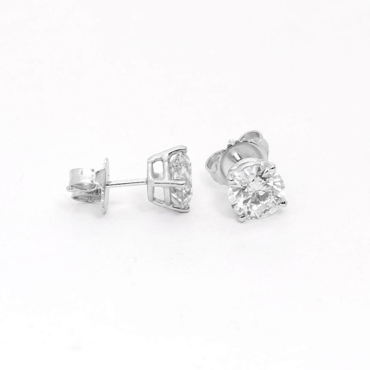 Round Brilliant Cut 2.09 Carat Diamond White Gold Stud Earrings In Excellent Condition In Dallas, TX