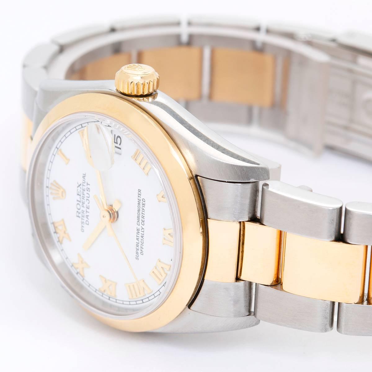 Rolex Datejust midsize 2-Tone Watch 178243 -  Automatic winding, 31 jewels, Quickset, sapphire crystal. Stainless steel case with 18k yellow gold smooth bezel (31mm diameter). White dial with Roman numerals. Stainless steel and 18k yellow gold