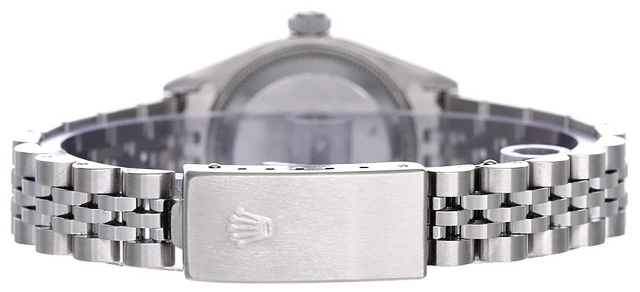 Automatic winding; 31 jewel; sapphire crystal. Stainless steel case with 18k white gold fluted bezel (26mm diameter). Silvered dial with stick markers. Stainless steel Jubilee bracelet. Pre-owned with custom box.