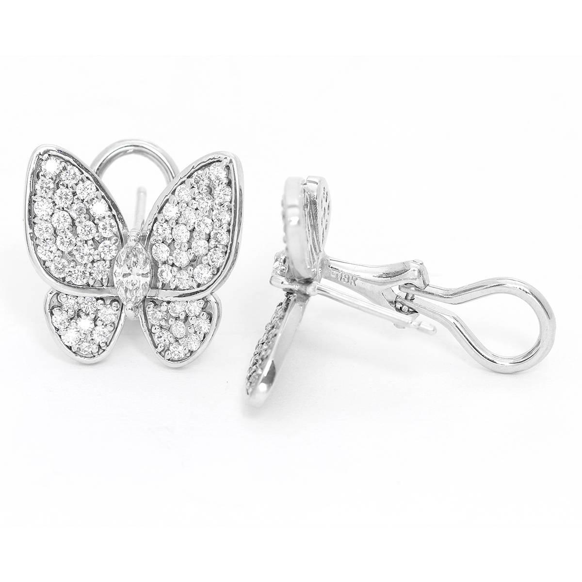 18K White Gold Diamond Butterfly Earrings - . Two Butterfly earrings,. 2 White gold earrings weighing .1.42cts diamonds. Omega backs. Total weight 7.5 grams. These dazzling pieces combine color and symmetry. Perfect to dress up or down.
Retail: