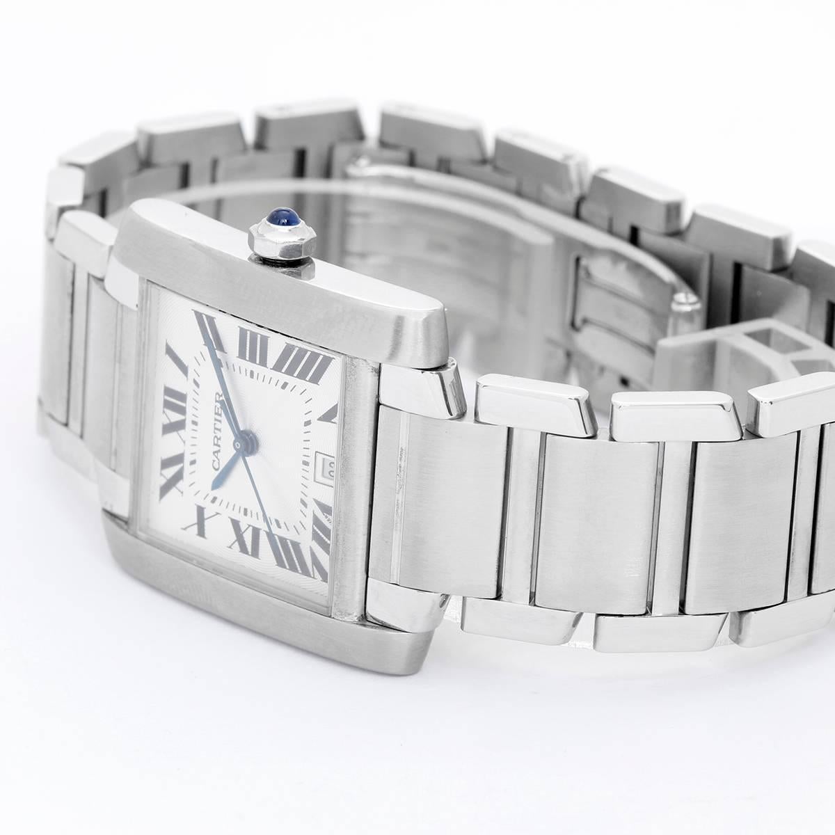 Cartier Tank Francaise Automatic Men's Stainless Steel Watch W51002Q3 -  Automatic winding. Stainless steel case (28mm x 35mm). Silvered guilloche dial with black Roman numerals; date at 6 o'clock. Stainless steel Cartier bracelet. Pre-owned with