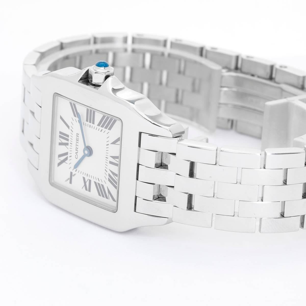 Cartier Santos Demoiselle Midsize Ladies Watch -  Quartz. Stainless Steel  (26mm). Ivory dial with Roman numerals. Stainless Steel  Cartier Bracelet with Deployant Buckle. Pre-owned with custom box.