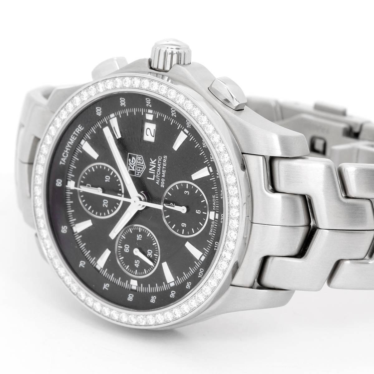 TAG Heuer Link Chronograph Men's Watch ( CJF2117 ) -  Automatic. Stainless Steel ( 42 mm). Black dial with stick hour markers; Chronograph, Date, Second hand  and Tachymeter. Factory Diamond bezel. Link stainless steel bracelet. Pre-owned with box.