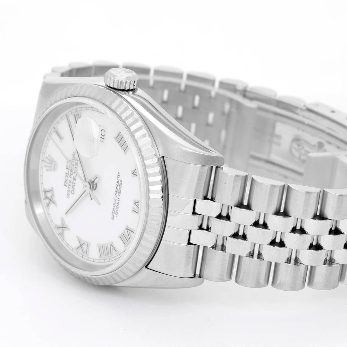 Rolex Datejust Men's Stainless Steel Watch 16234 -  Automatic winding, 31 jewels, Quickset, sapphire crystal. Stainless steel case with 18k white gold fluted bezel  (36mm diameter). Rhodium silvered dial with raised Roman numerals. Stainless steel
