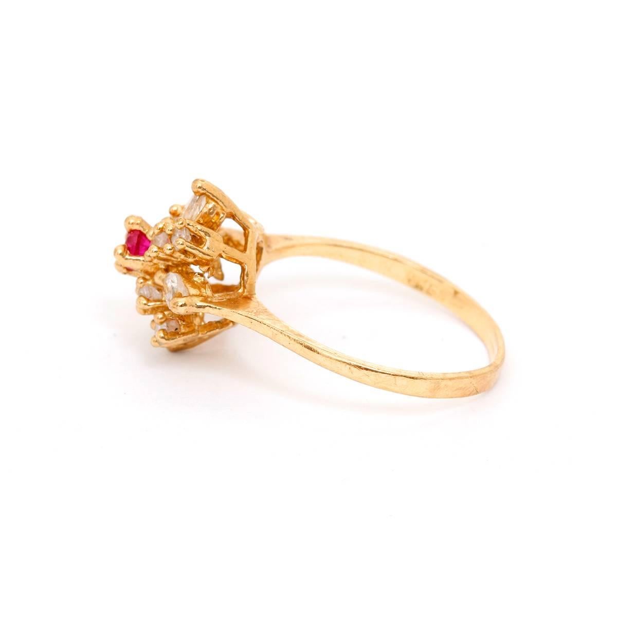 10K Yellow Gold Diamond Flower Ring Size 6.5 - . Flower diamond ring with a pink sapphire in middle. Total weight 2.3.