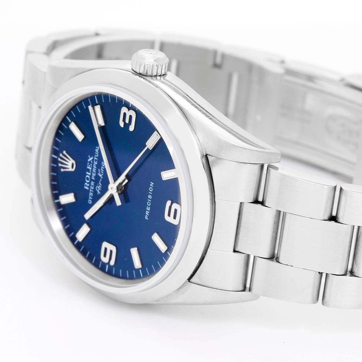 Rolex Air-King Men's Stainless Steel Watch Blue Dial 14000 -  Automatic winding, 27 jewels, no-date, sapphire crystal. Stainless steel case with smooth bezel (33mm diameter). Blue dial with luminous style markers and Arabic numerals. Stainless steel