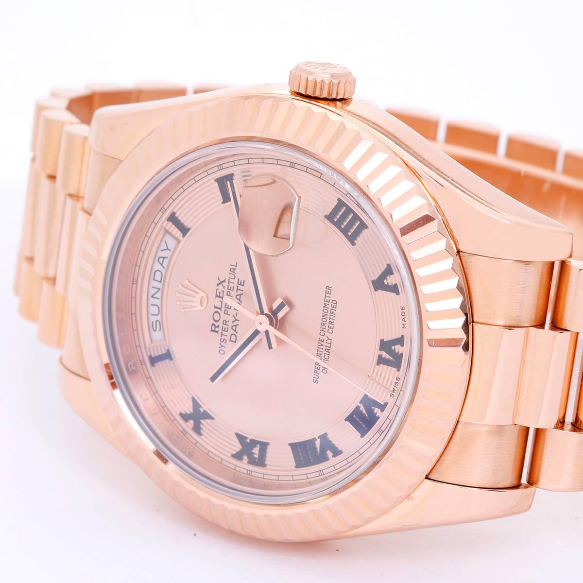 Rolex Day-Date II 41mm 18k Rose Gold Men's President Watch 218235 -  Automatic winding, 31 jewels, sapphire crystal, with day and date. 18k rose gold case with fluted bezel (41mm diameter). Pink concentric dial with black Roman numerals. 18k rose