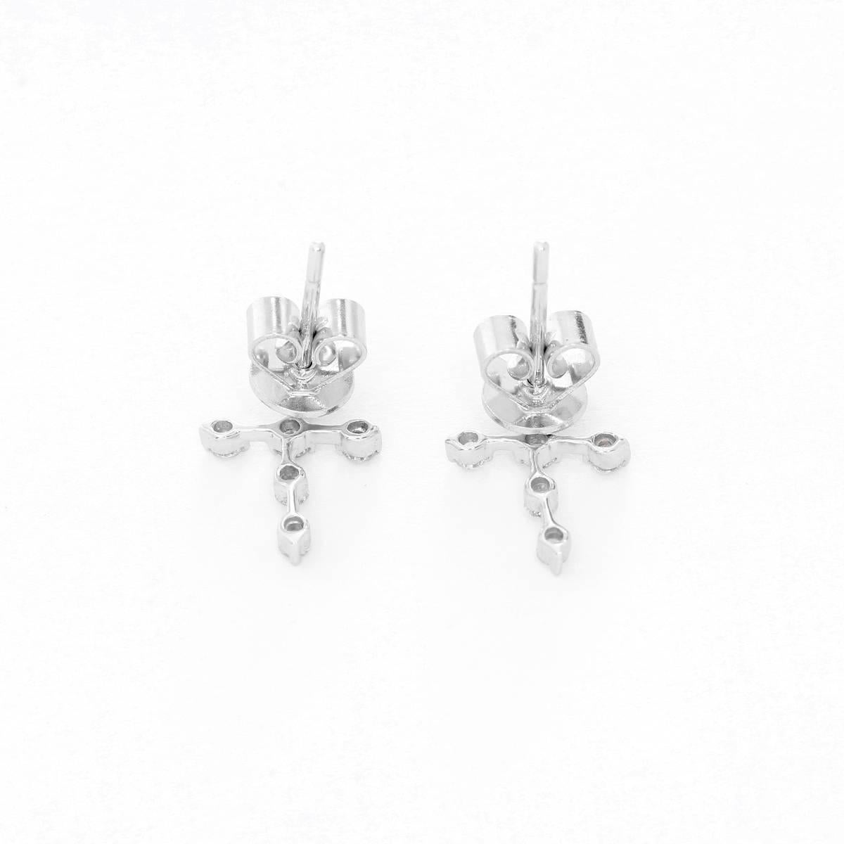 14K White Gold Diamond Cross Earrings - . Dainty white gold earrings with six diamonds equaling .26 carats. Total weight 1.36 grams.  Perfect diamond earrings for every day use!.
