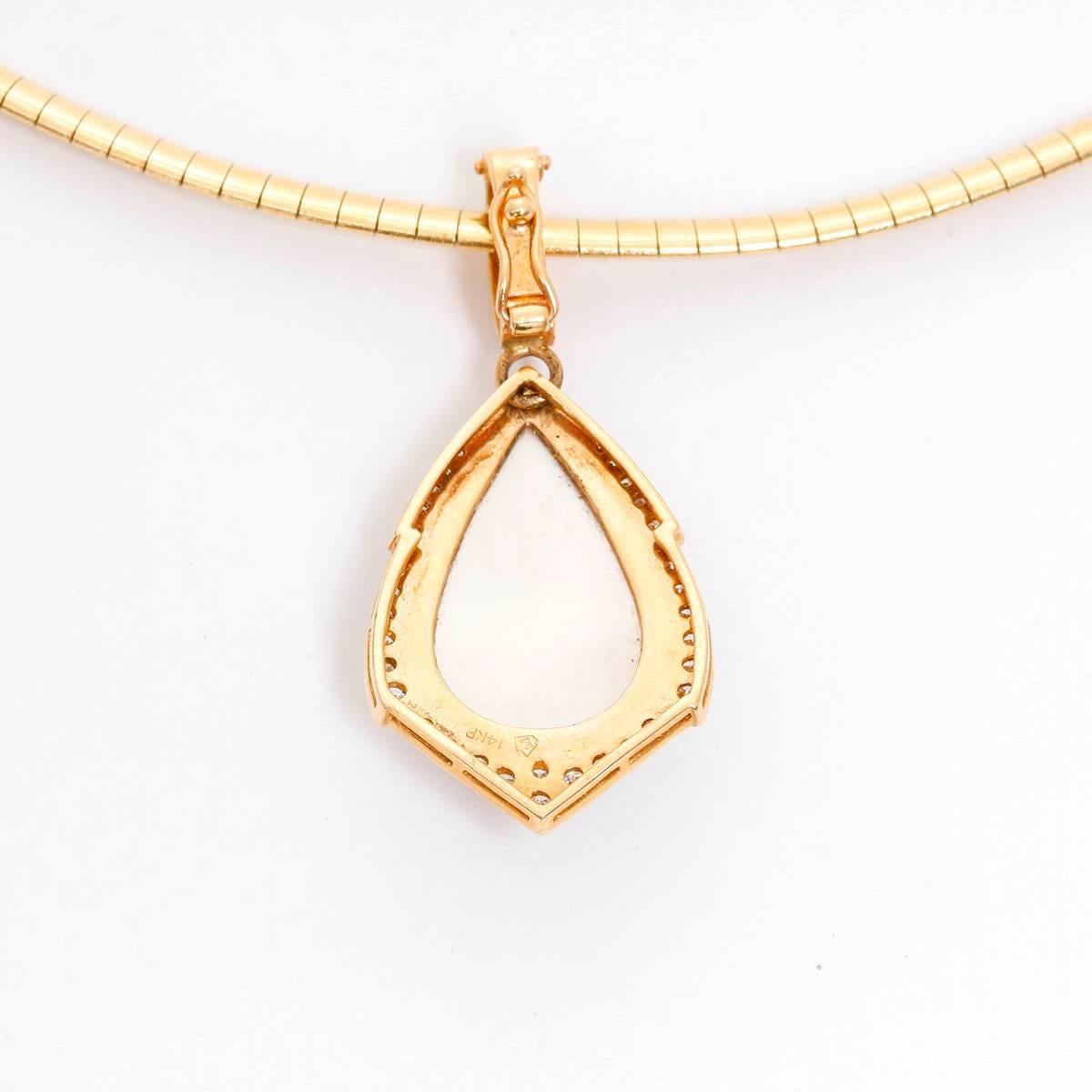 Mother of Pearl and Diamond Necklace - . 14K Yellow Gold Italian link necklace with a Mother pearl tear drop pendant surrounded by round brilliant diamonds. Necklace length 16 inches.  Total weight 22.2 grams.