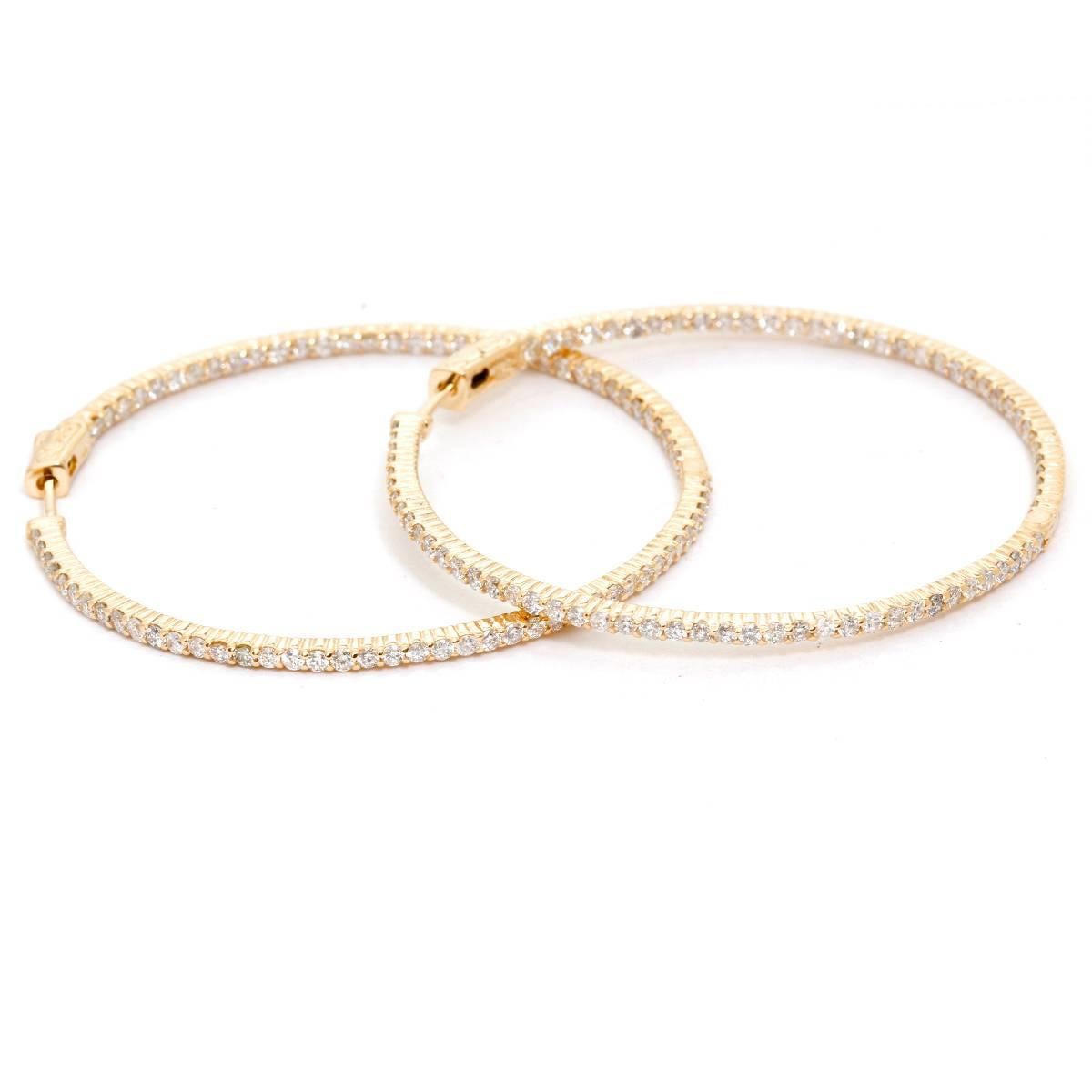 Beautiful Inside Out 18k Yellow Gold hoops - . 18K Yellow gold. 1 3/4  inch diameter, measuring 3 cts diamonds. Clarity I 1. Color GH color. Total weight 9.7 grams.