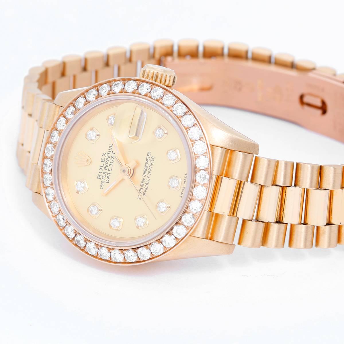Rolex Ladies President 18k Yellow Gold Automatic Watch 69178 -  Automatic winding; sapphire crystal. 18k yellow gold case and custom diamond bezel (26 mm diameter). Champagne dial with custom diamond markers. Pre-owned with box and books.