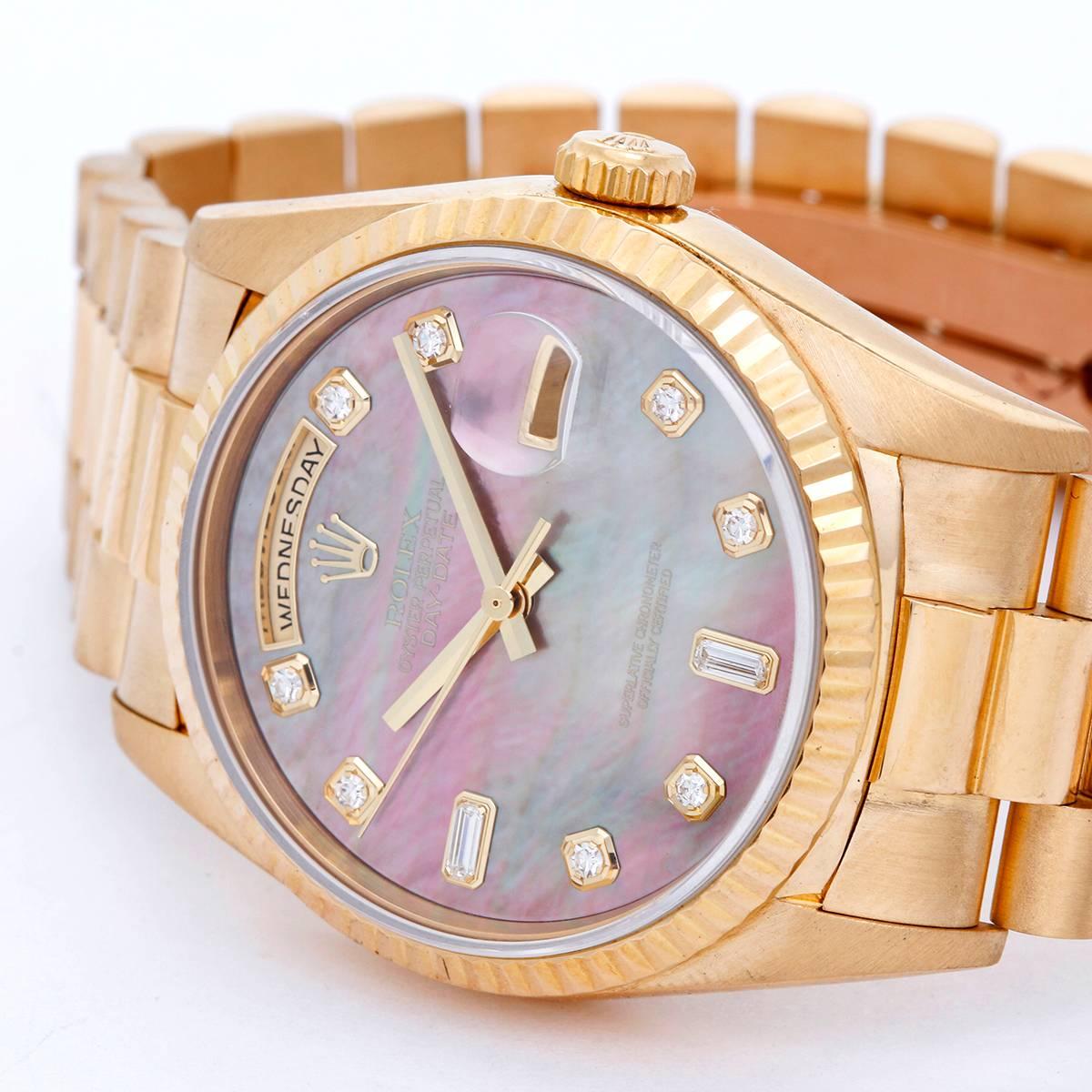 Men's Rolex President Day-Date Watch MOP  Dial 18238 -  Automatic winding, 31 jewels, double quickset, sapphire crystal. 18k yellow gold case (36mm diameter). Factory black mother of pearl dial with diamond hour markers. 18k yellow gold hidden-clasp
