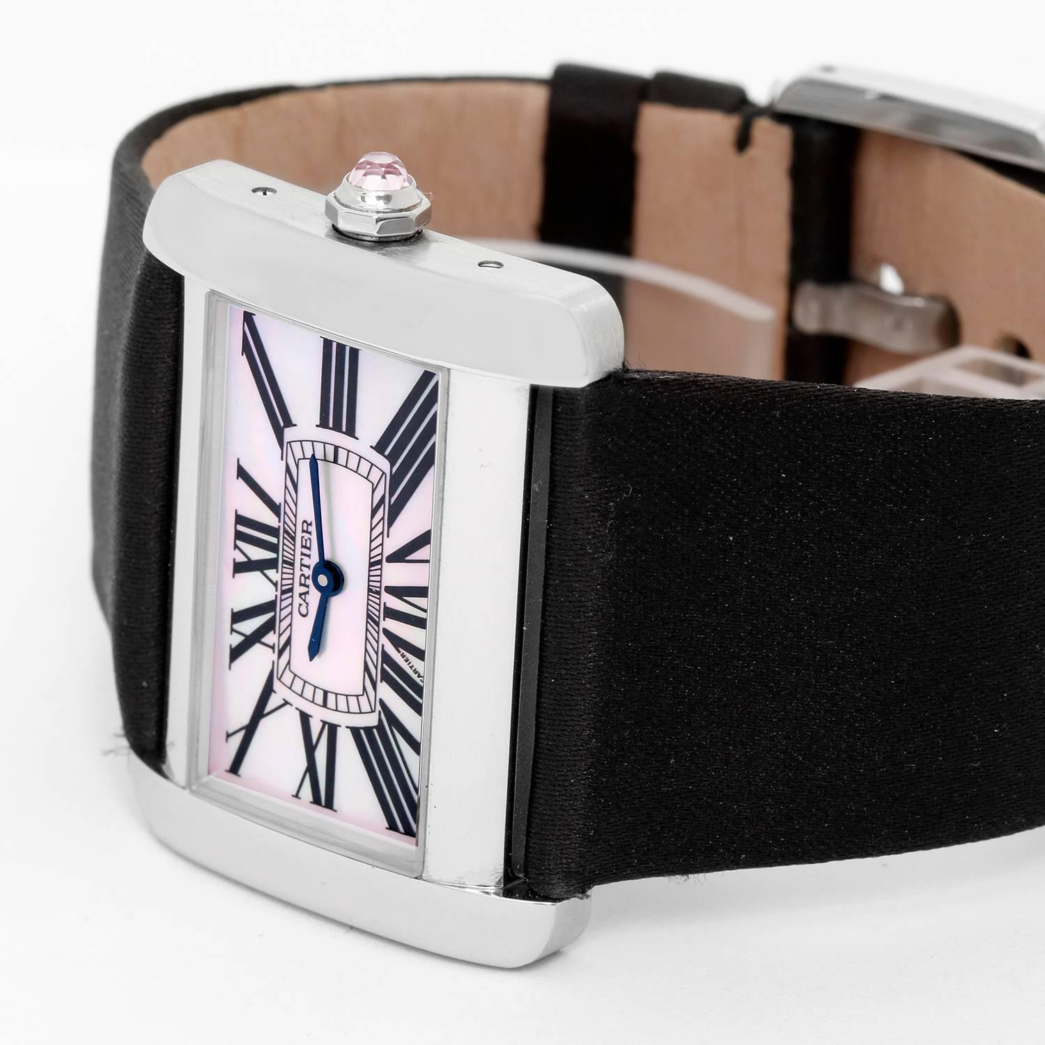 Cartier Tank Divan Stainless Steel Watch W6302003 -  Quartz. Rectangle Stainless Steel ( 38 mm x 31 mm) with pink Mother of Pearl dial with Roman Numerals. Black Cartier Satin Strap. Pre-owned with custom box. Number 184 out of 500 in the series.