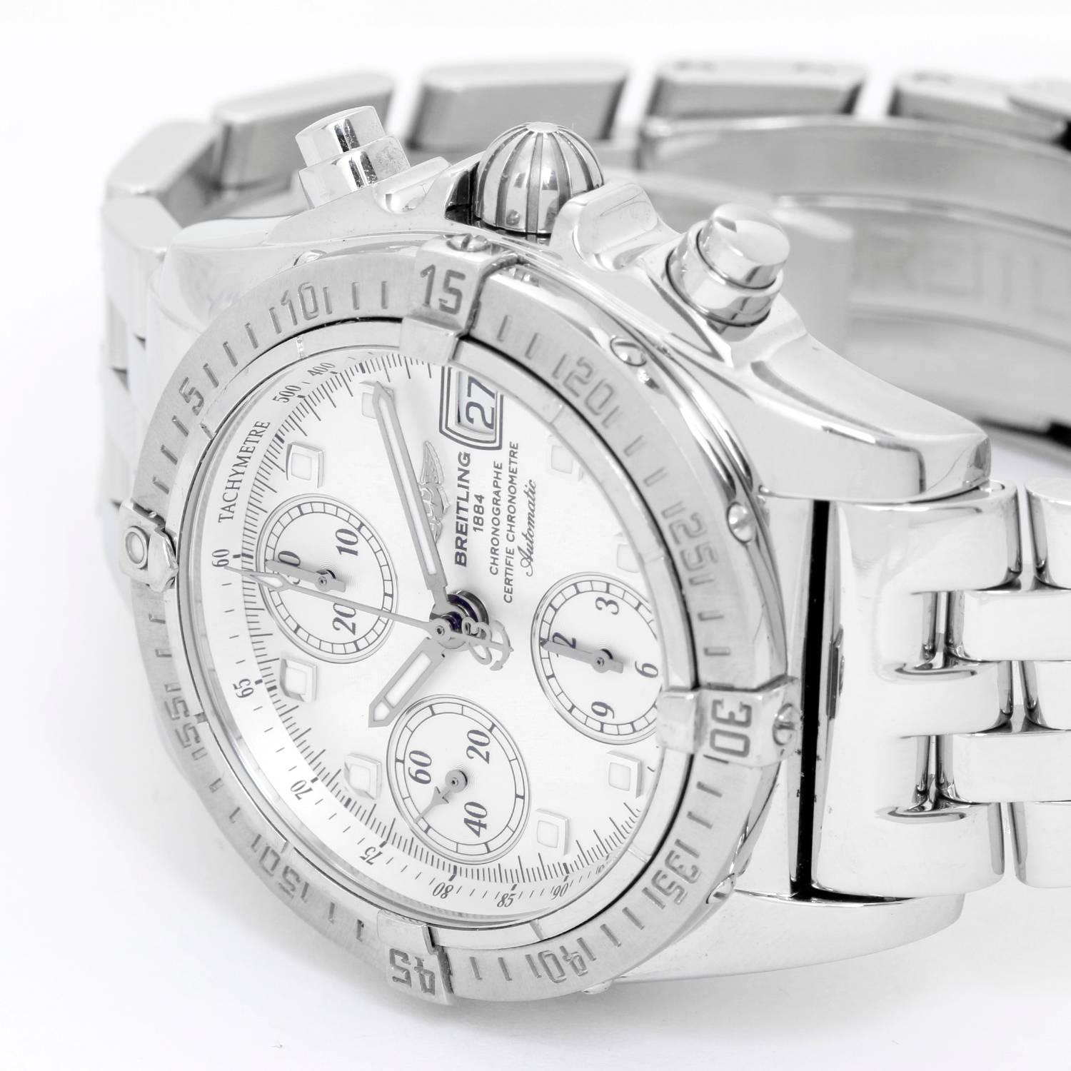 Breitling Chrono Cockpit Chronograph Men's Steel  Watch A13357 -  Automatic winding chronograph. Stainless steel case with rotating bezel (39mm diameter). Silver dial with silver subdials; hour, minute and seconds recorders; date at 3 o'clock.