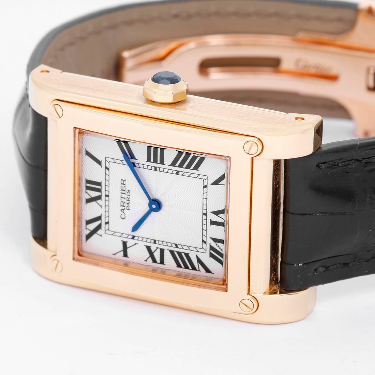 Cartier Tank A Vis Ref 2608 F Watch -  Manual. 18K Yellow Gold ( 18 mm x 40.5 mm ). White dial with Roman Numerals. Cartier black strap with 18K gold Cartier deployant clasp. Pre-owned with box and papers. Service papers, original invoice too. Full