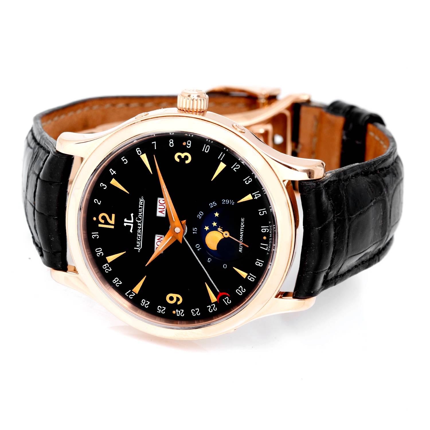 Jaeger-LeCoultre Master Date Rose Gold Men Watch -  Automatic. 18K Rose Gold round style ( 37 mm ). Black dial with Rose Gold hour markers and Arabic numerals; Moonphase subdial at 6 o'clock. Black alligator strap with 18k Rose Gold Jaeger-LeCoultre