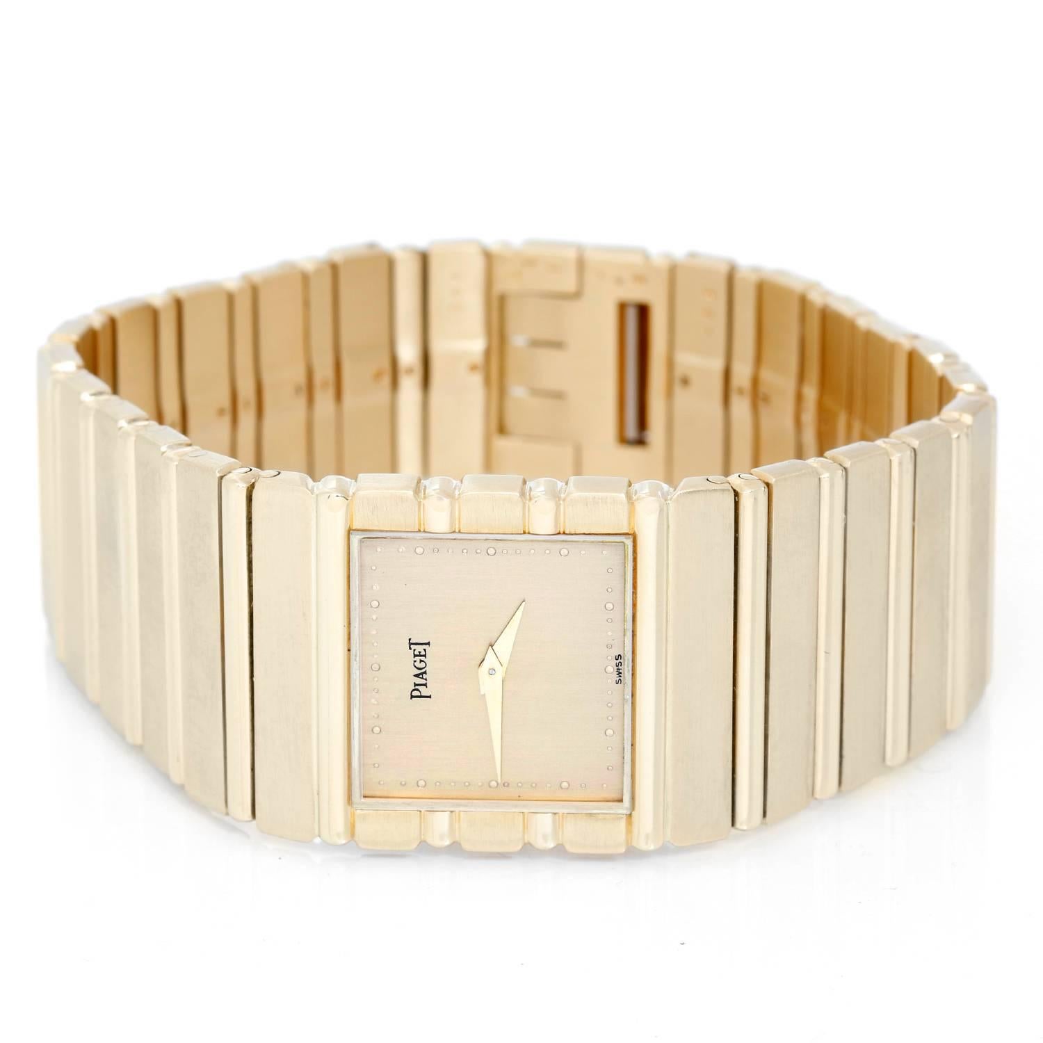 Piaget Polo 18K Yellow Gold Men's Watch -  Quartz. 18K Yellow Gold ( 25 x 35 mm ). Brushed gold dial with round hour markers. 18K Yellow Gold bracelet. Pre-owned with custom box.