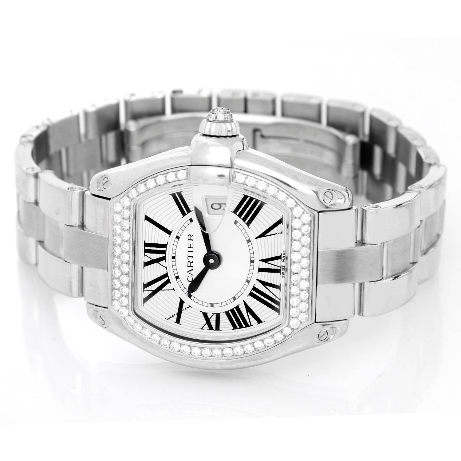 Cartier Roadster Ladies 18K White Gold Diamond Watch WE5002X2 -  Quartz. 18K White Gold Cartier Diamond bezel and Diamond cabochon setting on crown ( 30 x 35 mm). Silvered Guilloche dial with black Roman numerals. 18K White Gold Cartier bracelet