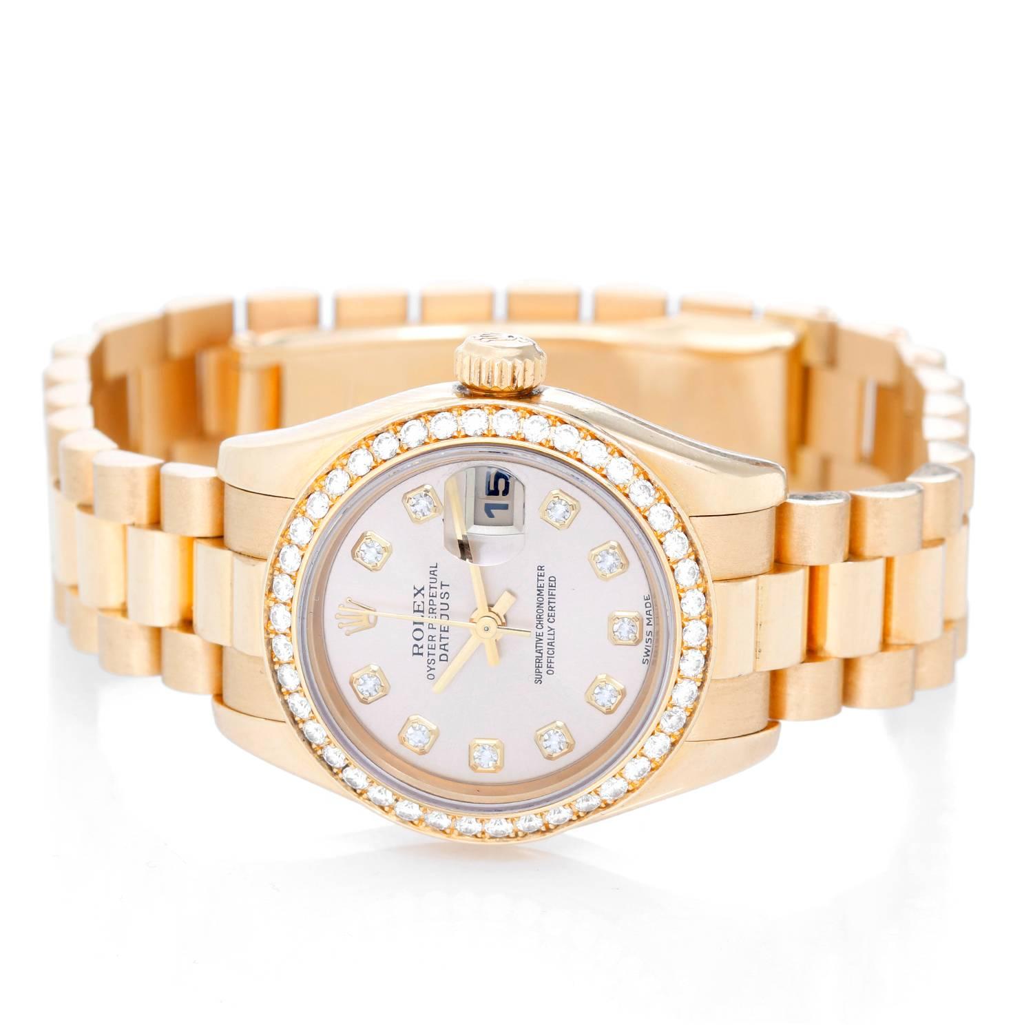 Ladies Rolex President 18k Yellow Gold Diamond Watch 179138 -  Automatic winding, 31 jewels, Quickset date, sapphire crystal. 18k yellow gold case with factory diamond bezel (26mm diameter). Silver  dial with factory diamond hour marker. 18k yellow