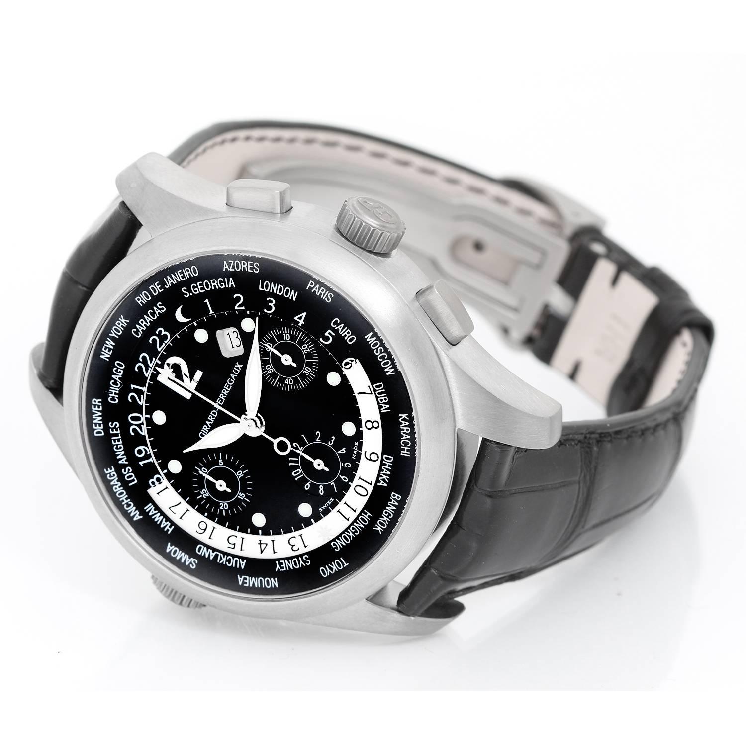 Girard-Perregaux World Time Titanium Ref 49800 -  Automatic ; Water Resistant 50m. Titanium case ( 43 mm ). Black dial with luminous hour markers; Hours - Minutes - Seconds - Date - Chronograph - World Time Display - Exhibition Case Back. Black