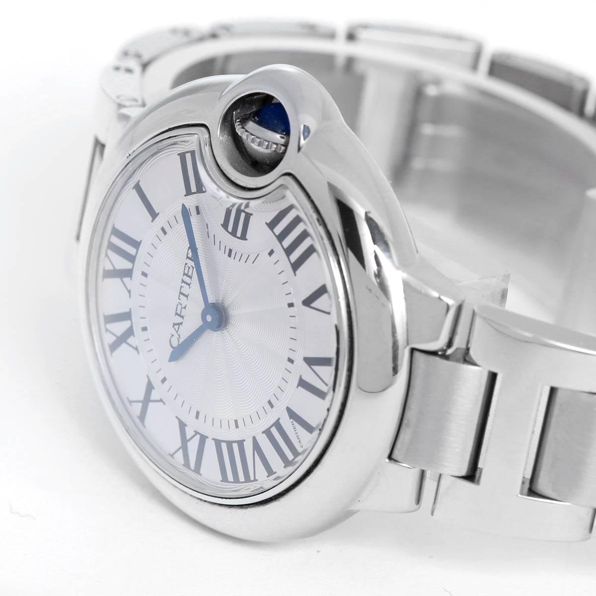 Cartier Ballon Bleu 36 mm Stainless Steel Watch W69011Z4 -  Quartz. Stainless Steel ( 36 mm ). Silver Guilloche dial with blue hands. Stainless Steel. Pre-owned with custom box.