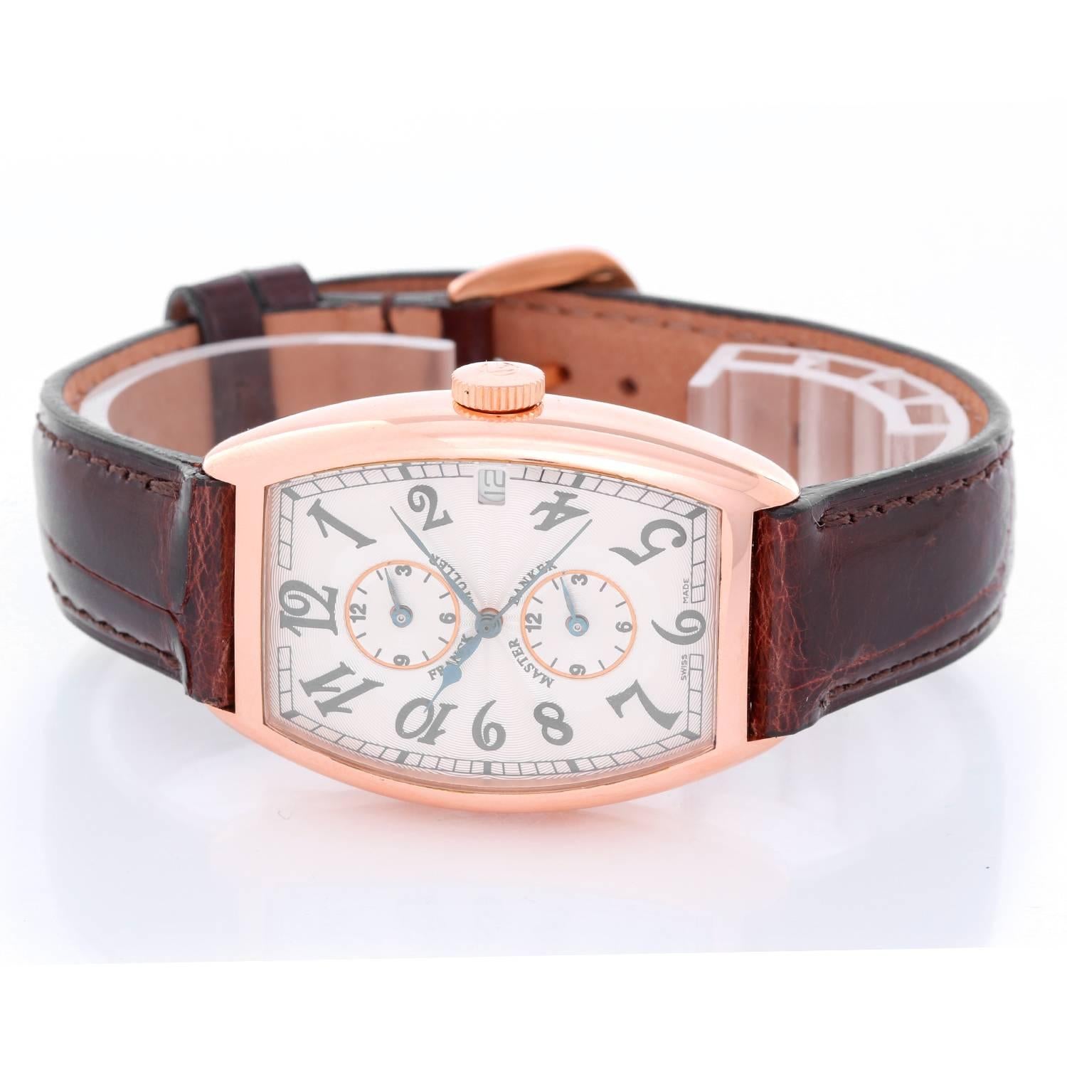 Franck Muller Master Banker  Men's Watch Ref 5850 MB -  Automatic winding; Sapphire crystal. 18K Rose Gold ( 32 x 45 mm ). Silver Guilloche dial with luminous Arabic numerals. 2 silver suddials for two other time zones; date at 3 o' clock. Brown