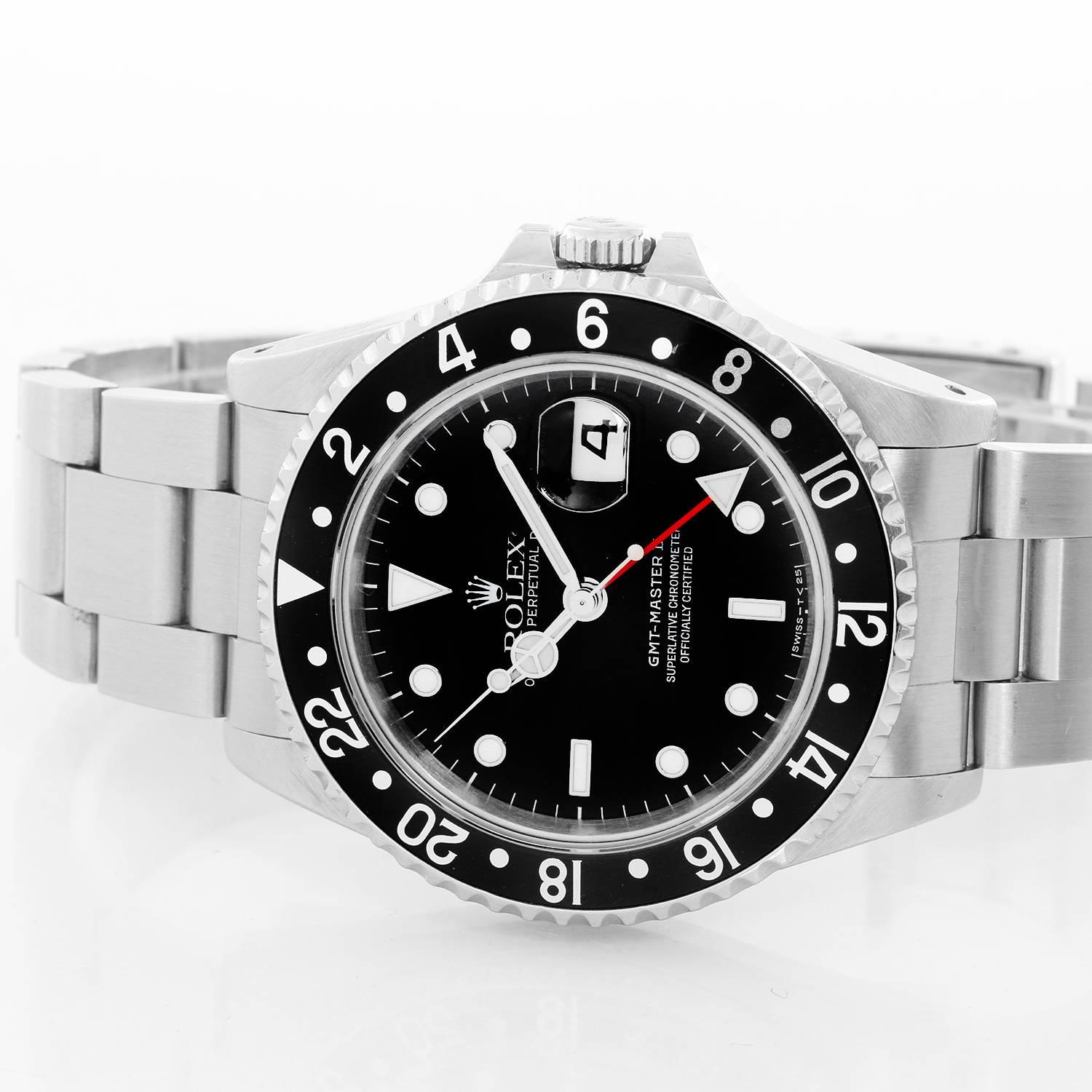 Men's Rolex GMT-Master II Watch 16710 -  Automatic winding, 31 jewels, Quickset, sapphire crystal. Stainless steel case; rotating bezel with red/blue bezel (40mm diameter). Black dial with luminous style markers. Stainless steel Oyster bracelet.