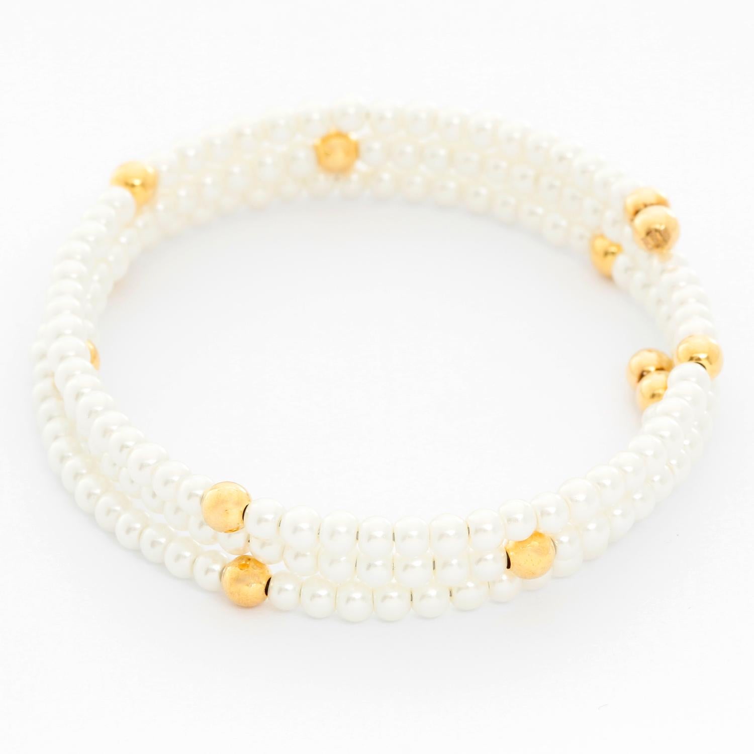 White Pearl Glass Bead Bracelet - Gorgeous wrap cuff bracelet with 3 strands of 3mm white pearls and 4mm gold accent beads. Bracelet measures 6.5 inches but offers stretch for larger wrists. New with DeMesy box.