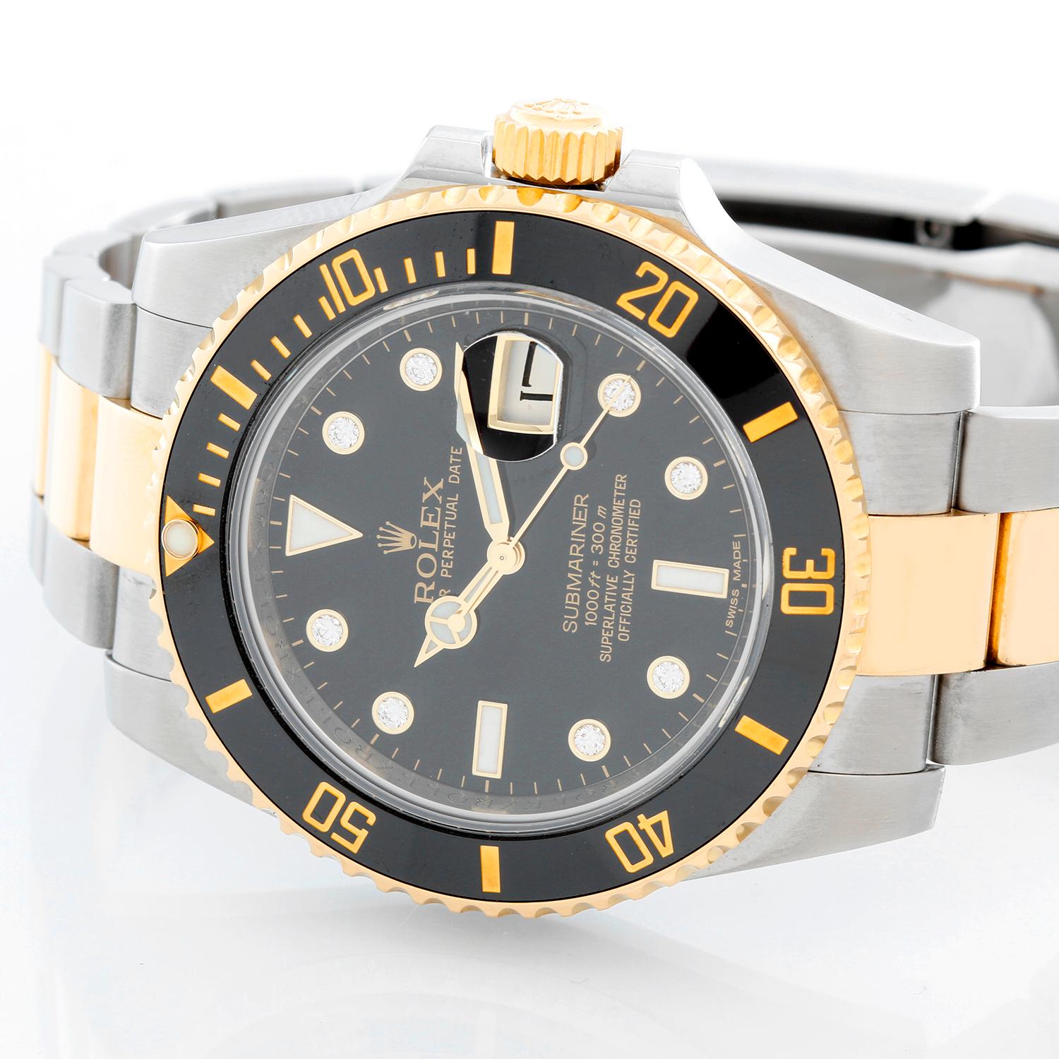 Rolex Submariner 2-Tone Steel & Gold Men's Watch 116613 LB - Automatic winding, 31 jewels. Stainless steel case with 18k yellow gold time-lapse ceramic Cerachrom engraved bezel (40mm diameter). Black diamond dial with luminous markers; date at 3