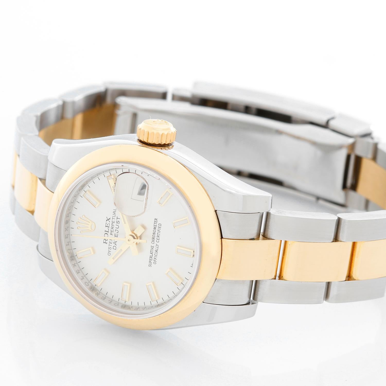 Rolex Ladies Datejust 2-Tone Stainless Steel & 18k Gold Watch 179163 -  Automatic winding. Stainless steel case with smooth 18k yellow gold bezel (26mm diameter). Silver dial with stick markers. Stainless steel and 18k yellow gold Oyster bracelet.