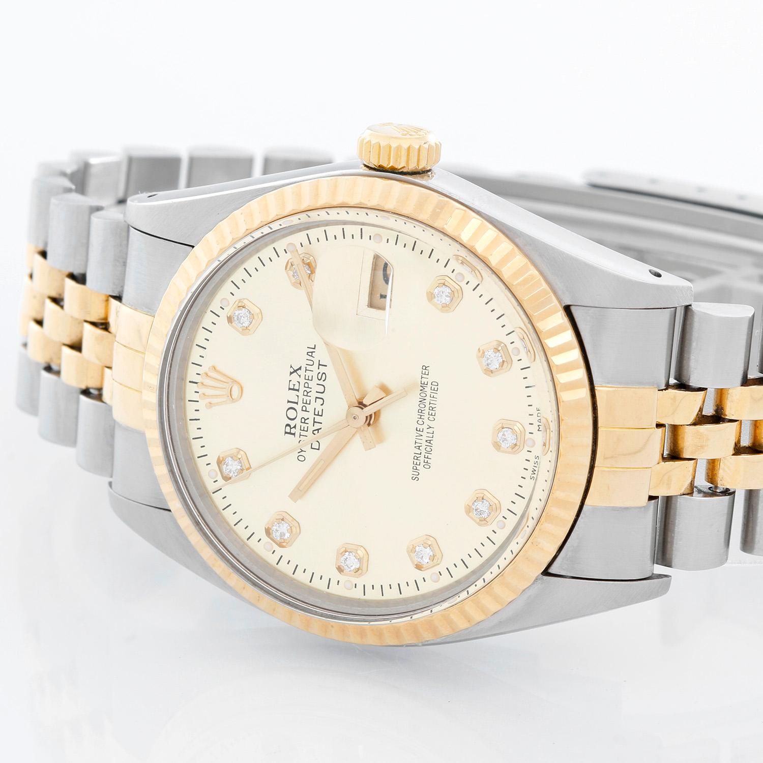 Men's Rolex Datejust 2-Tone Watch 16013 - Automatic winding, 27 jewels, Quickset, acrylic crystal. Stainless steel and 18k yellow gold fluted bezel . Champagne dial with custom diamond hour markers. Stainless steel and 18k yellow gold Jubilee