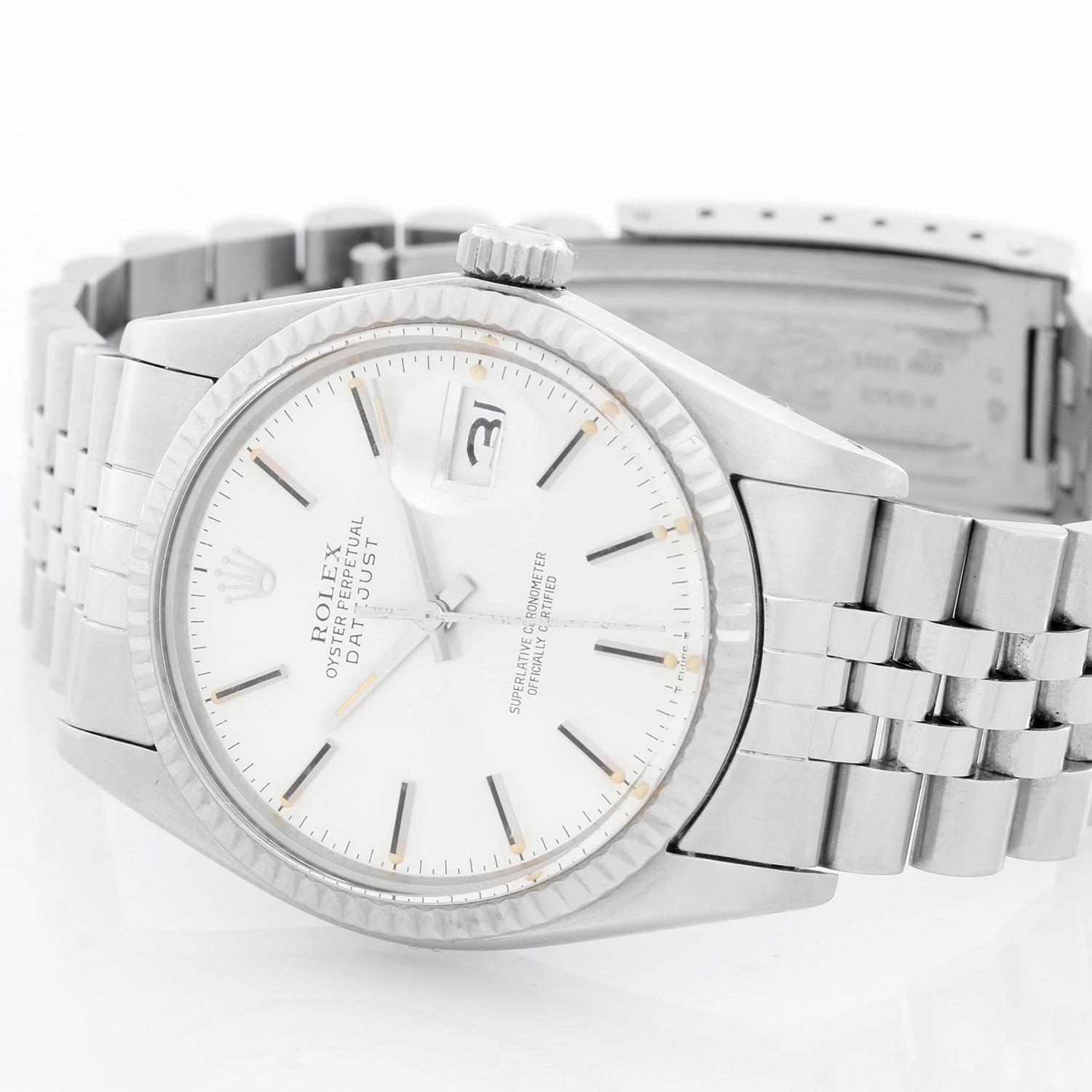 Rolex Datejust Men's Stainless Steel Watch Silver Dial 16014 - Automatic winding, 27 jewels, Quickset, acrylic crystal. Stainless steel case with white gold Fluted bezel (36mm diameter). Silver dial with stick hour markers . Stainless steel Jubilee