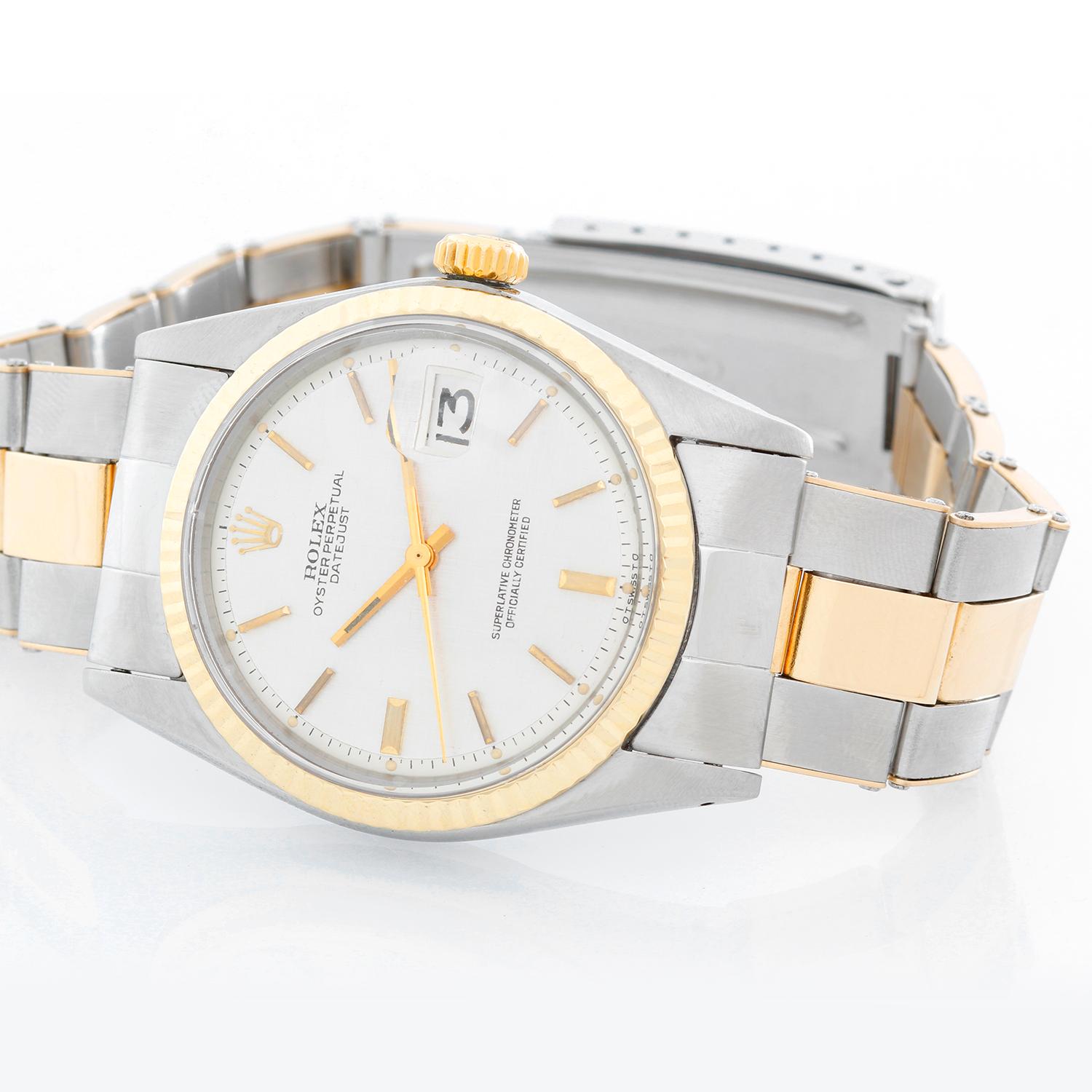 Collectors Rolex Men's Two Tone Datejust 1601 Early Edition  - Automatic winding. Stainless steel case with 14K yellow gold fluted bezel ( 36 mm ). Silver textured dial with stick hour markers. Two tone oyster bracelet with 14K gold center links and