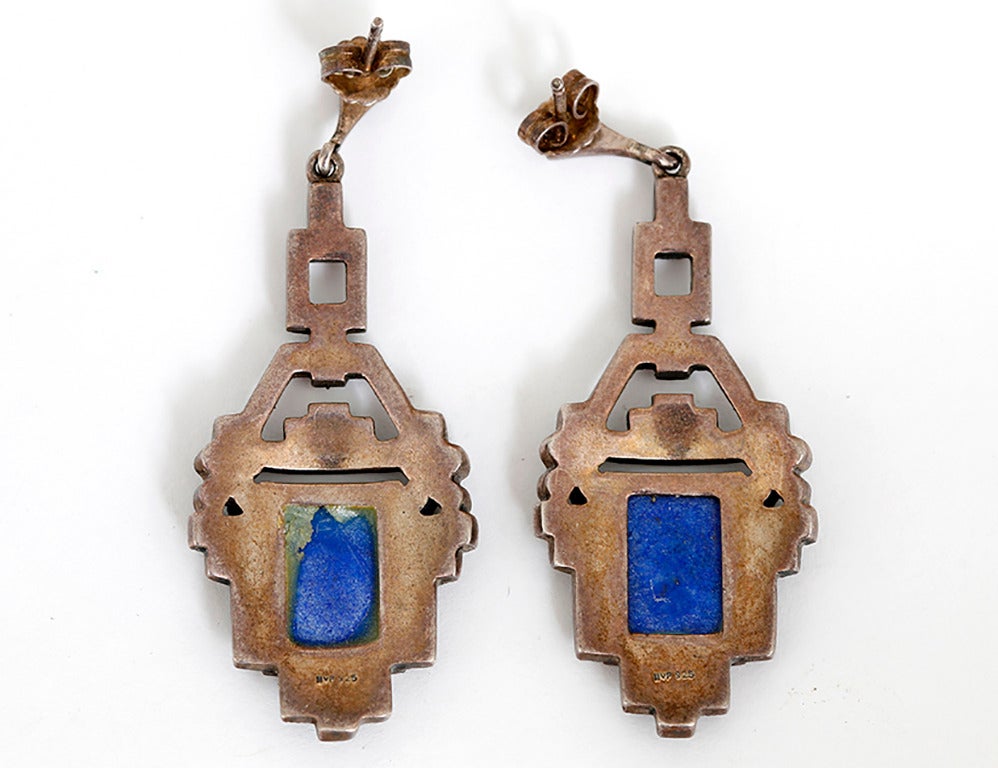 These antique drop earrings are stunning, featuring marcasite and lapis set in silver. Earrings measure apx. 2-inches in length and apx. 3/4-inches in width at the widest. Total weight is 12.9 grams.