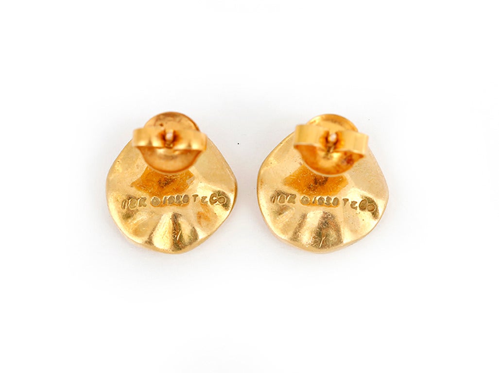 These amazing Tiffany & Co. studs feature diamonds set in 18k yellow gold. Stamped 18K, 1980, and T & Co. Earrings measure apx. 1/2-inch in diameter with a total weight of 8.2 grams. These earrings are amazing for everyday wear or evening!