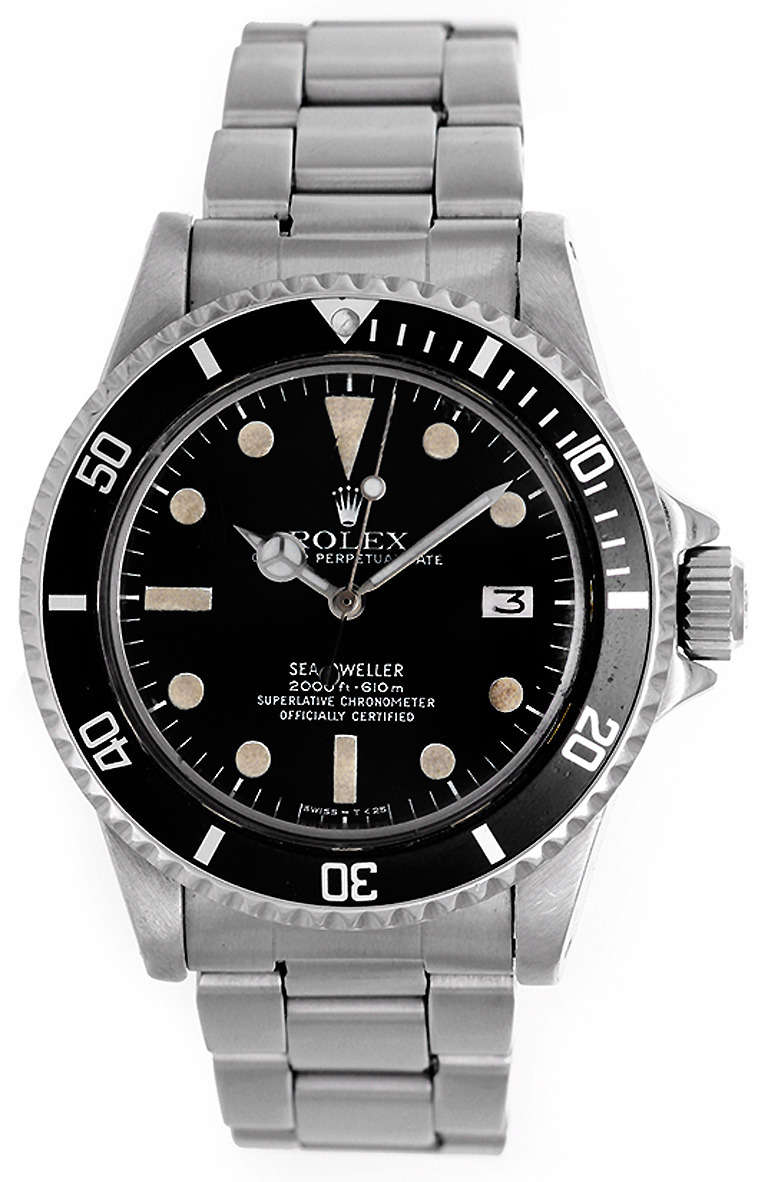 Automatic movement with date, acrylic crystal. Stainless steel case, 40mm, with helium escape valve. Black dial with luminous markers. Stainless steel Oyster bracelet. Serial number 5379669, circa 1977. Pre-owned.