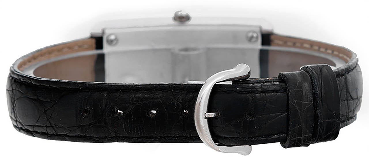 Quartz. 18k white gold case with diamond bezel (21mm x 39mm). White dial with black Roman numerals. Strap band with 18k white gold Maurice Lacroix buckle. Pre-owned with custom box.